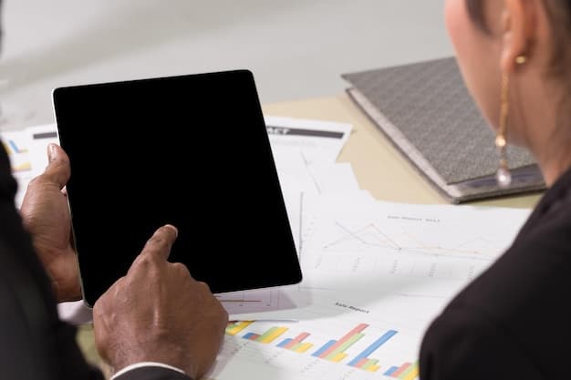 A close-up of a financial analyst reviewing an S&P 500 company's Q1 2025 earnings report on a computer screen, with annotations highlighting key metrics such as net income, effective tax rate, and capital expenditures.