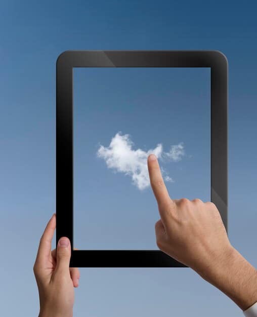 A close-up of a hand selecting a cloud storage option on a tablet, with various application icons surrounding the selection, illustrating the ease of accessing cloud services. The background shows a busy small business office, subtly blurred.