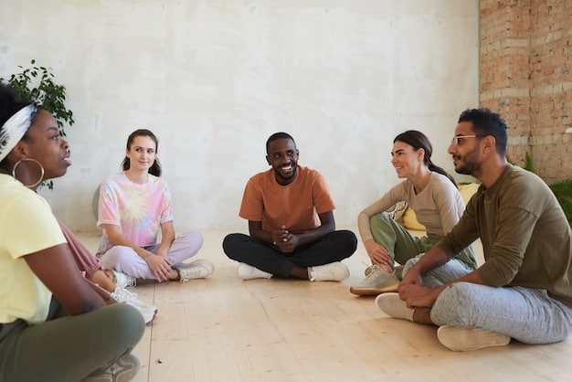 A group of people participating in a guided meditation session, sitting comfortably in a circle with a facilitator leading them. The atmosphere is peaceful and supportive.
