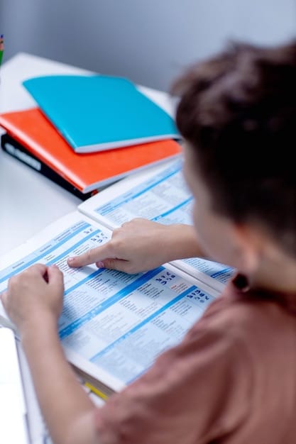 A close-up shot of a student meticulously organizing their college application documents, including transcripts, test scores, and essay drafts, highlighting the importance of organization.