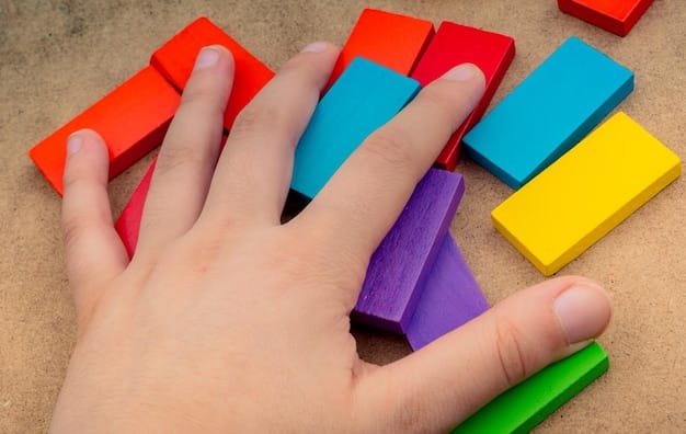 A close-up of a child's hands using colorful building blocks, focusing on the development of fine motor skills and problem-solving abilities.