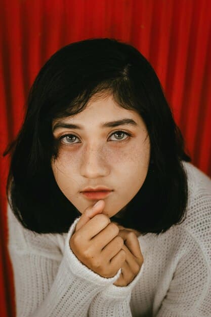 Close-up shot of a female K-drama character with red, teary eyes, looking intensely at someone off-screen. Her expression is a mix of sadness and determination.