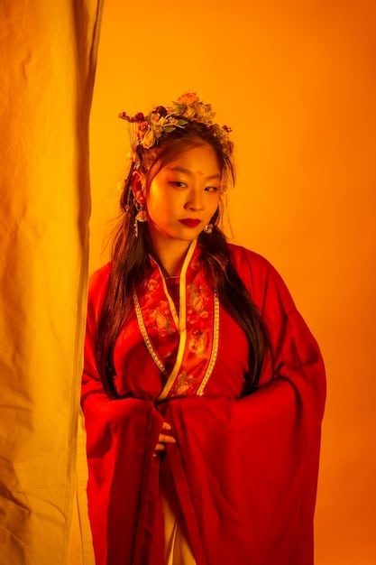 A close-up shot of a female lead in a historical drama, wearing elaborate traditional Korean clothing, with a determined expression. The background is slightly blurred to keep the focus on the actress.