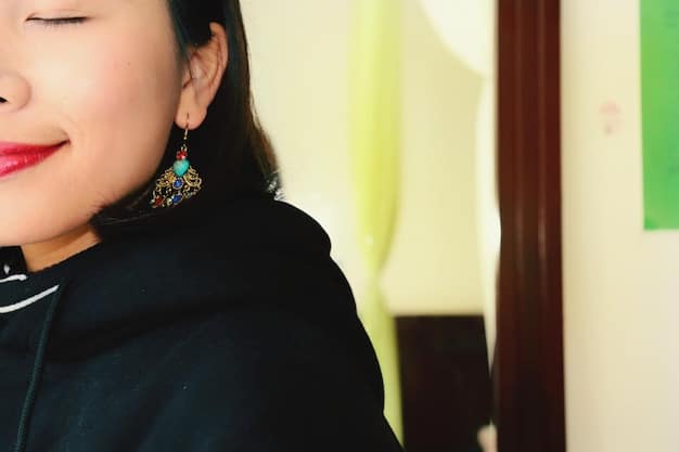 A close-up of a person accessorizing a simple outfit with statement jewelry inspired by K-drama styles, focusing on earrings and layered necklaces.