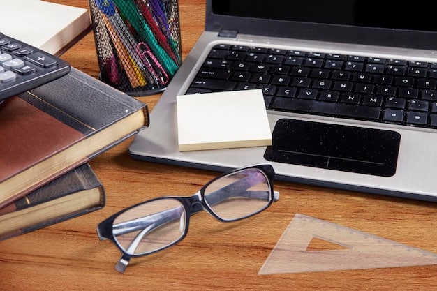 A stack of books with a pen and a pair of glasses on top, with a laptop in the background displaying research data, illustrating the tools and resources for a detailed critique.